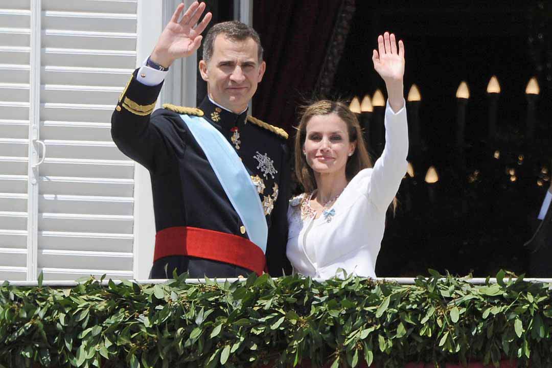 Spanish King Felipe VI and Queen Letizia salute on the balcony of the Royal Palace as part of the celebration of the investiture of Spain Crown Prince Felipe of Borbon and Greece as King in Madrid , Spain , on Thursday 19th June 2014 , Madrid